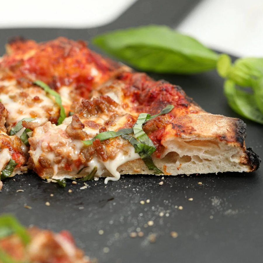 Sausage pizza slice