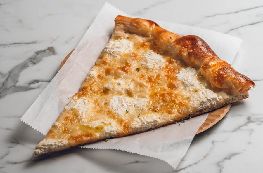 White pizza slice with ricotta